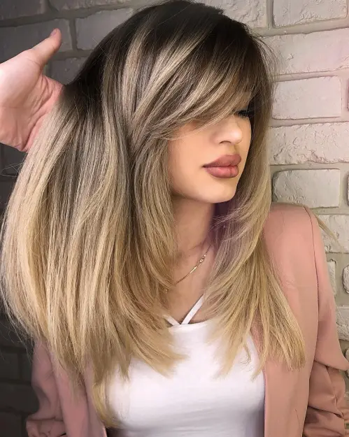 Layered Haircut With Side-swept Bangs